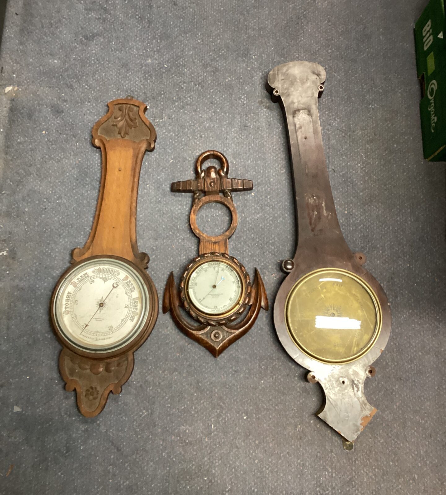 Three antique oak cased barometers