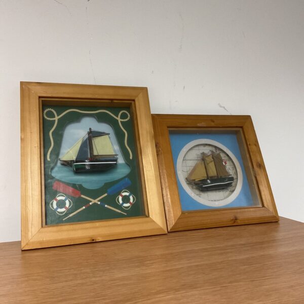 Pair of nautical wooden ship framed dioramas