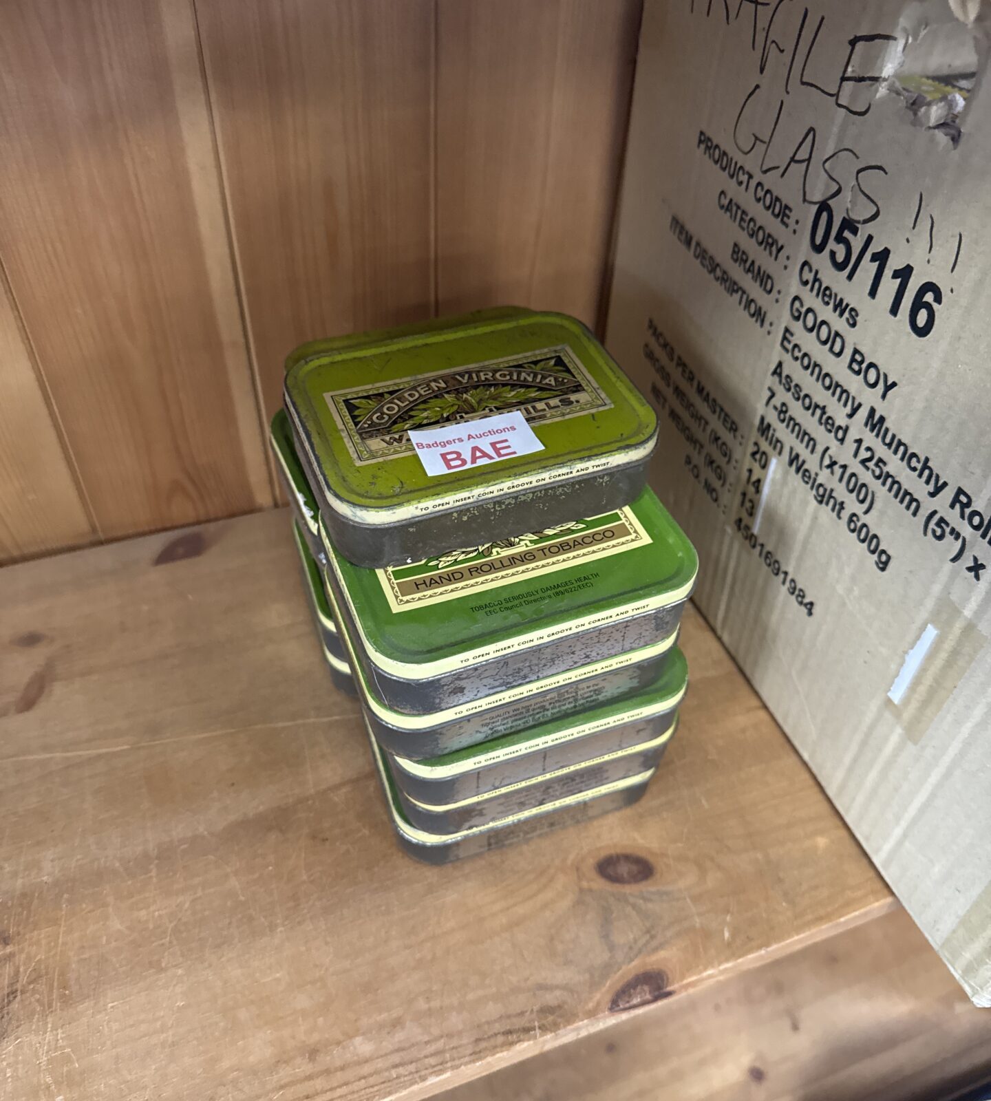 Eleven golden Virginia tobacco tins