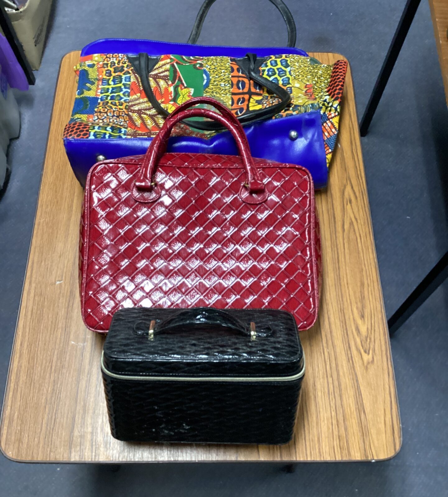 Three ladies bags inc estee lauder crocodile skin style hand bag