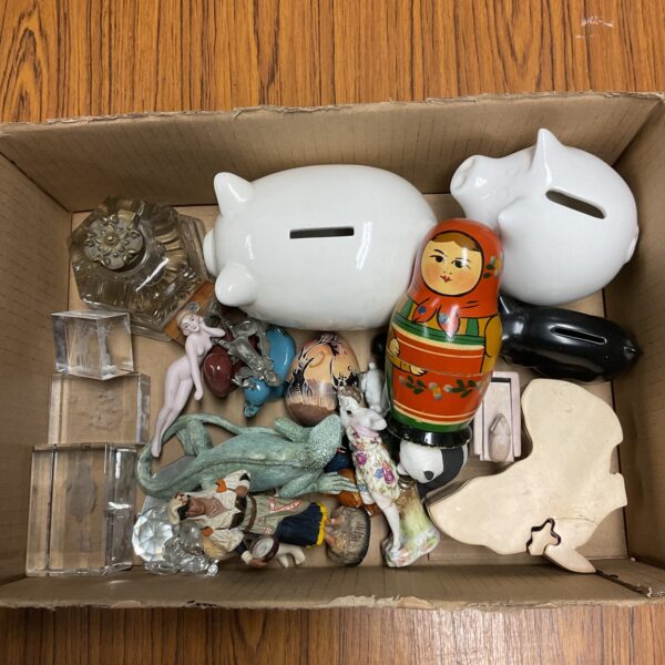 Tray of collectables including paperweights, piggybanks & russian doll