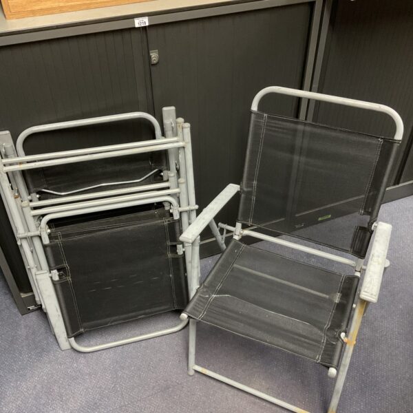 Lot of four folding garden chairs for outdoor use.