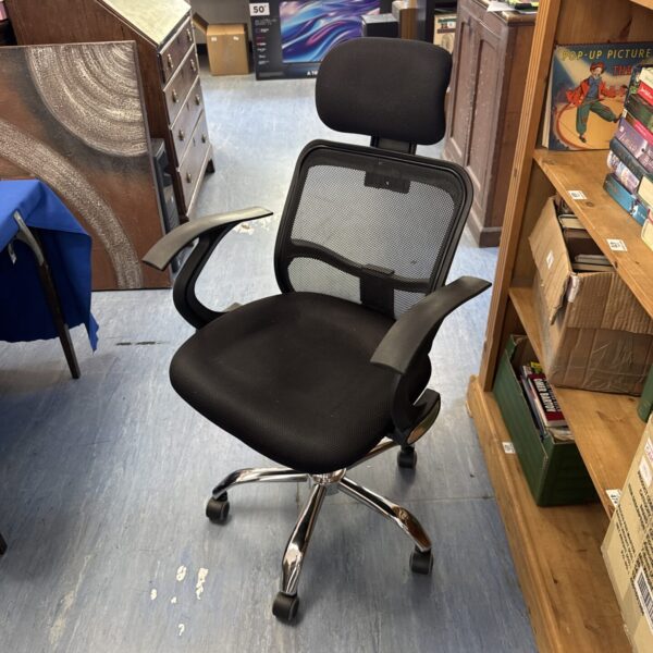 Modern mesh office chair with swivel base and casters.