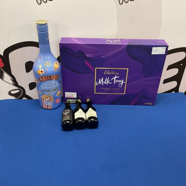 Selection of mixed items inc Sealed Baileys Toffee Popcorn, three bottles of port and new cadbury milk tray new in date