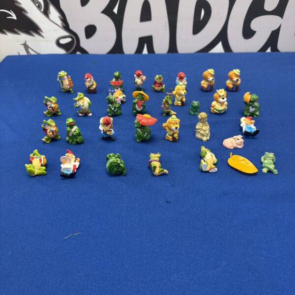 Vintage lot of colourful Kinder Egg figures for collectors.