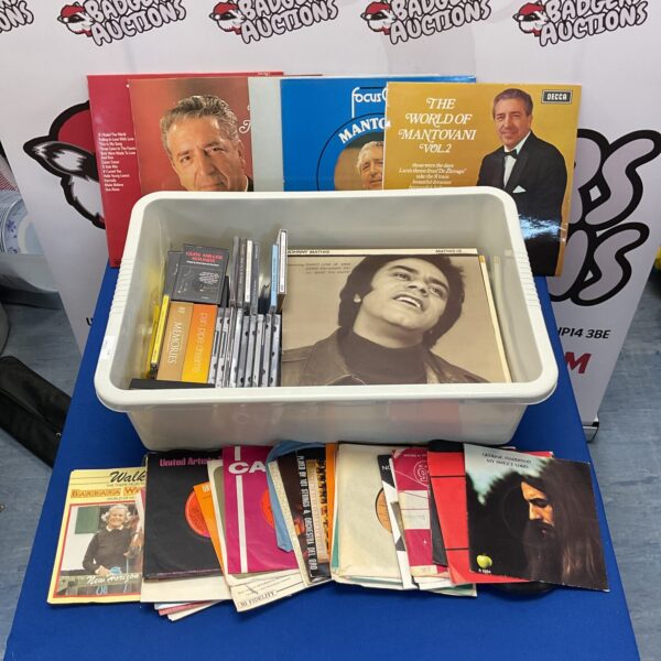 Collection of 12” & 7” vinyl records including george harrison