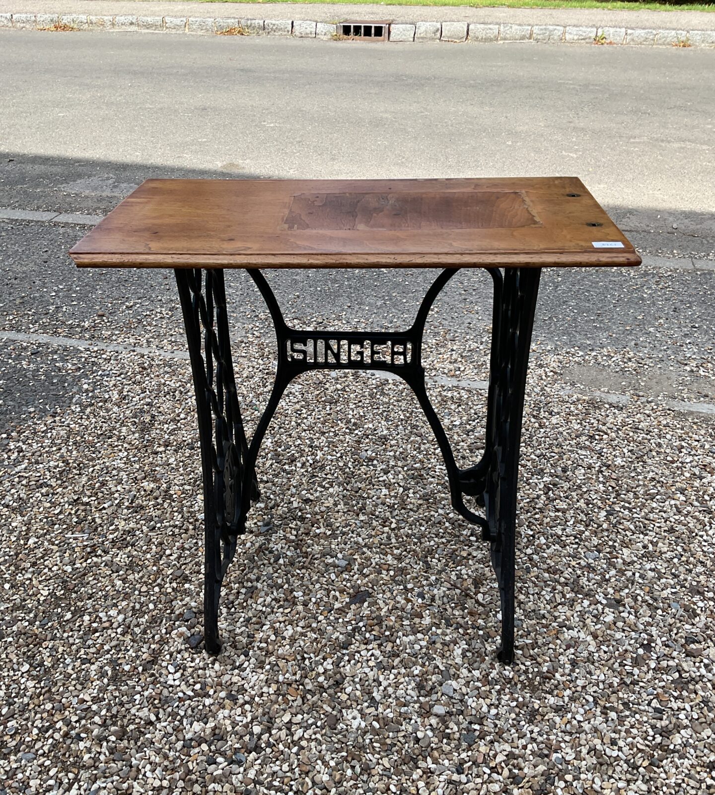 Turn of the century cast iron singer treadle base side table