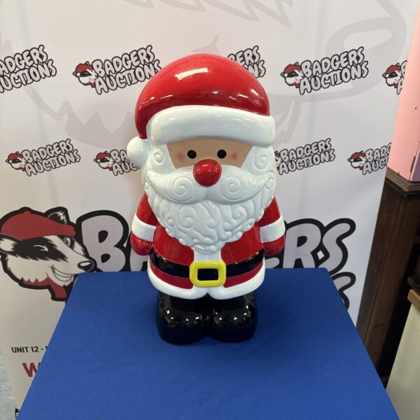 Large plastic Christmas Santa decoration for festive holiday displays.