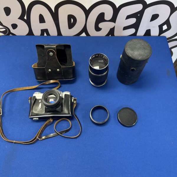 Vintage zenit e camera with additional Japanese lens