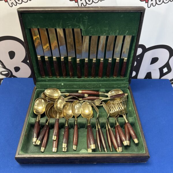 Vintage bronze coloured cutlery set in case