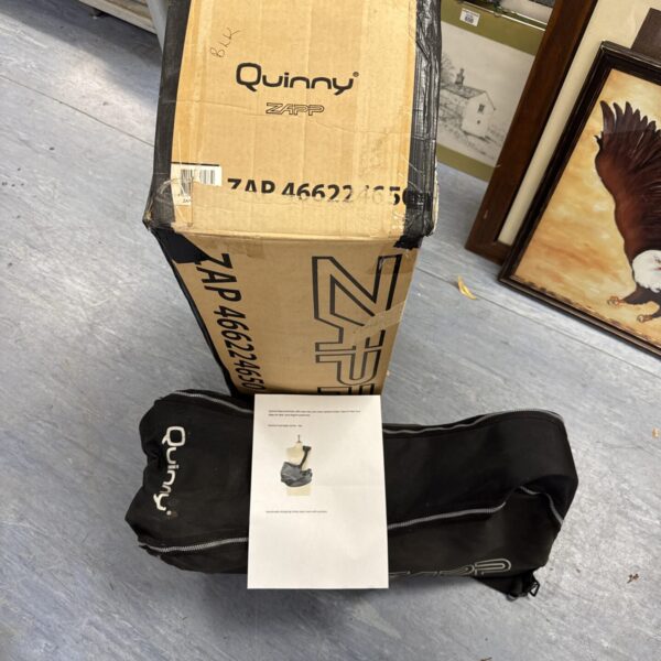 Quinny Zapp pushchair with included accessories for baby travel.