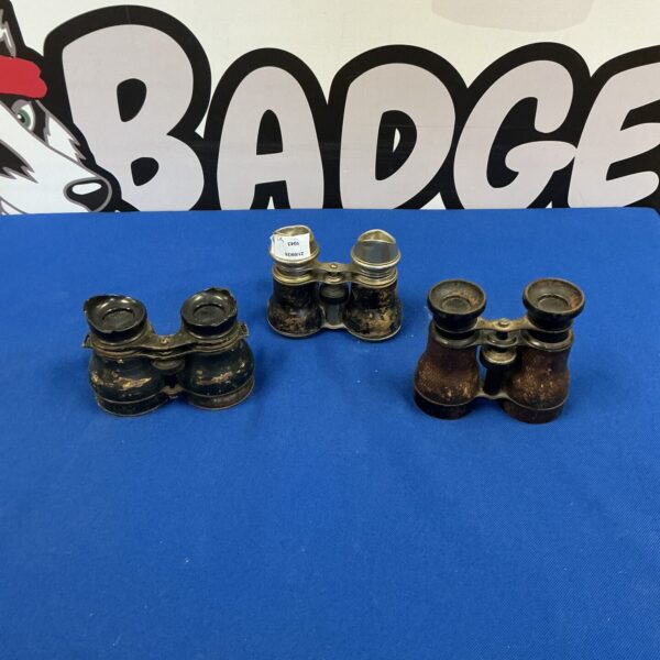 Vintage binoculars lot, antique optical instruments for collectors.