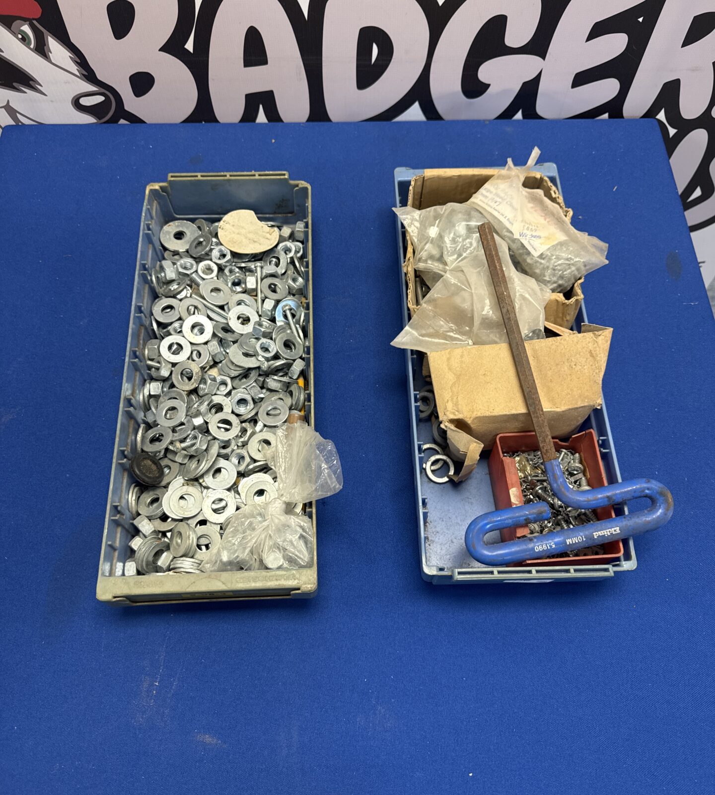 Two trays of shed clearance items inc nuts, washers & tacks