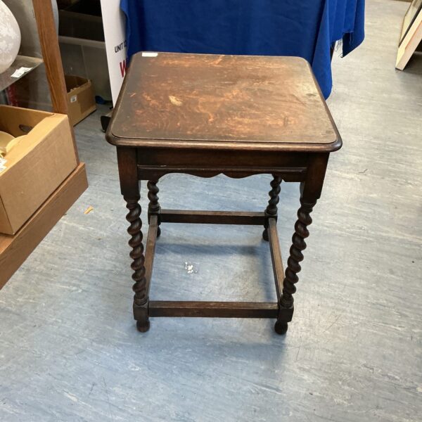 Small mahogany barley twist table with decorative legs.
