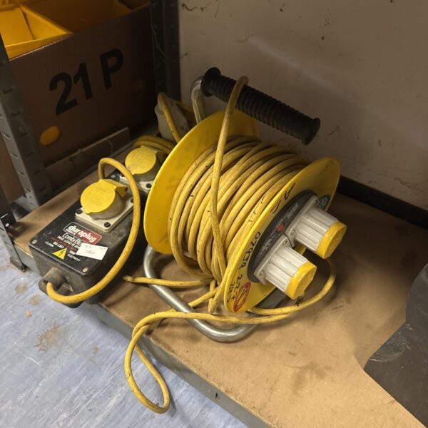 Yellow Duraplug extension reel with combi block for site use.