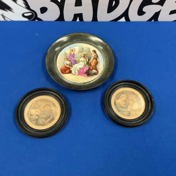 Vintage wall plates with a floral design for home decor.