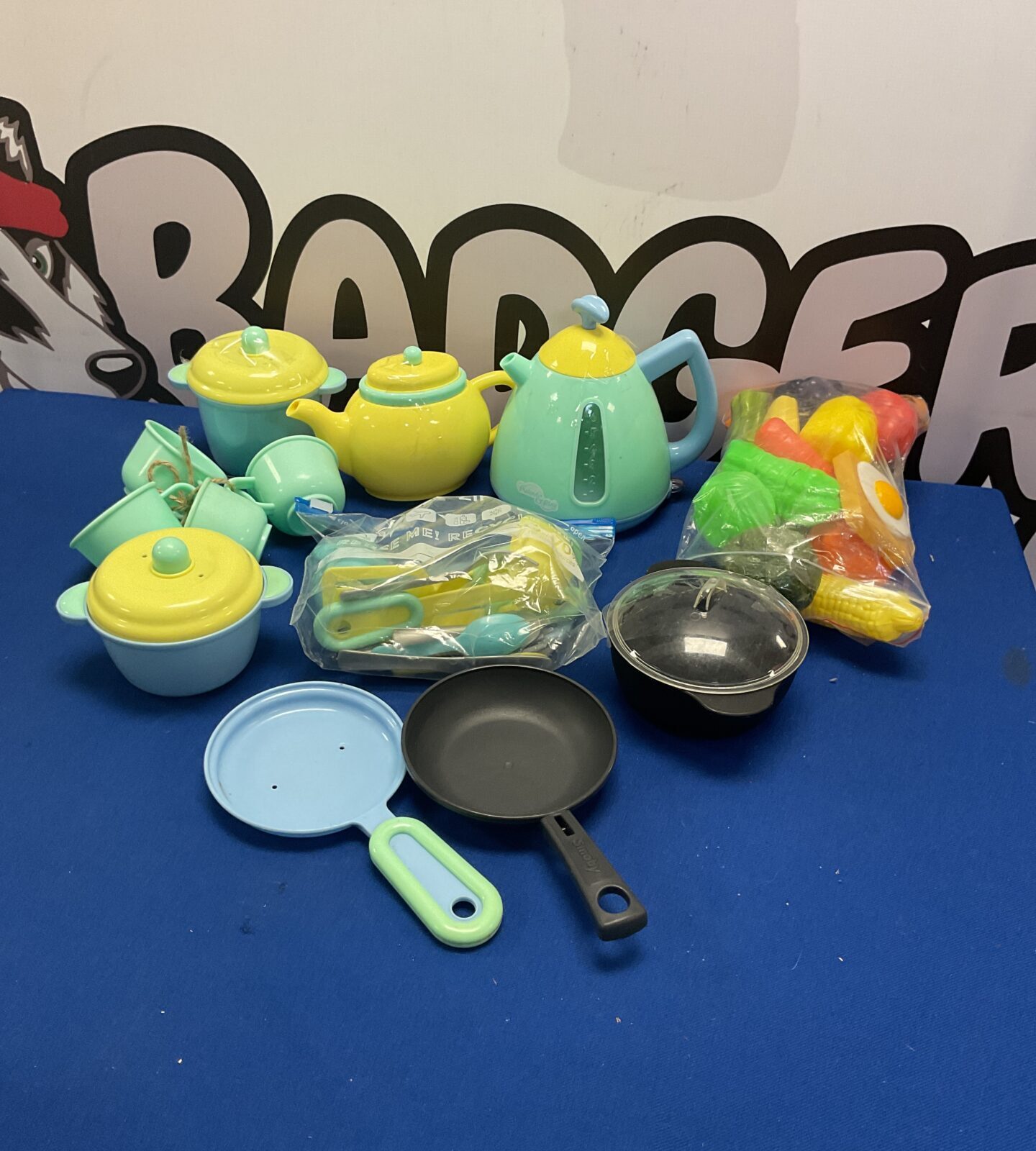 Box of plastic childrens toy kitchenware and foods