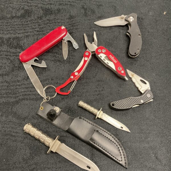 Assorted vintage pocket knives and multi tool collection.