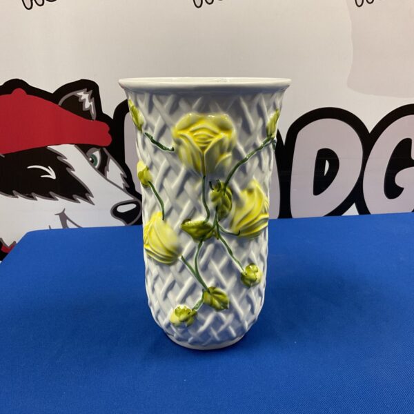 Vintage yellow rose porcelain vase with textured design.