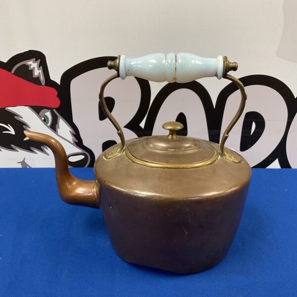 Vintage copper kettle with translucent glass handle