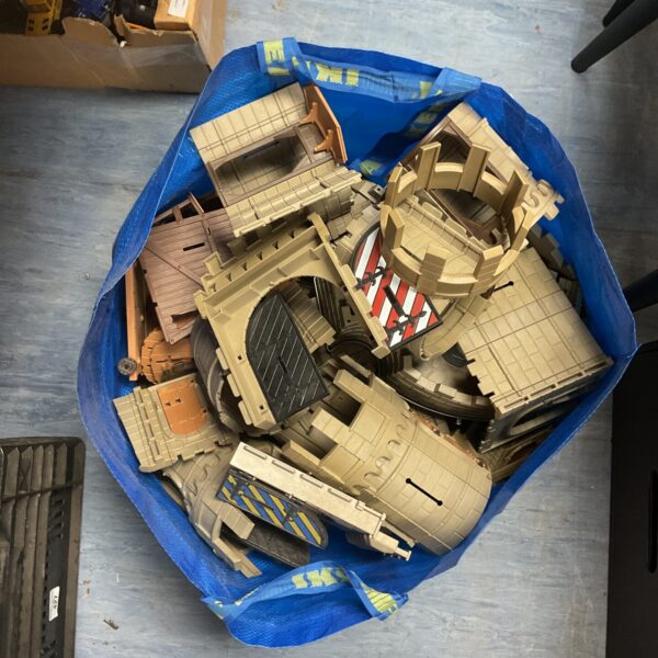 Bag containing playmobile castle set