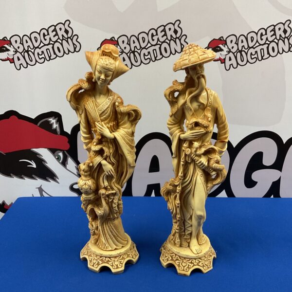 Vintage pair of Chinese resin figures for collectors.