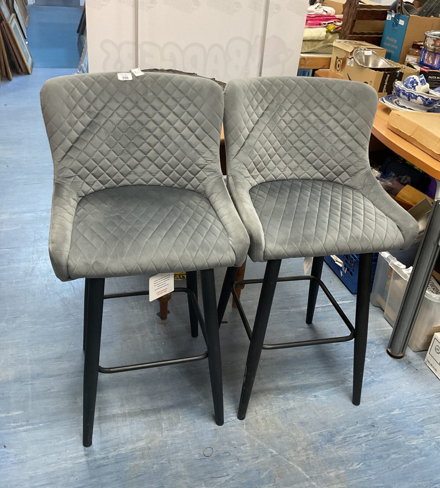 Two modern velvet grey bar stools