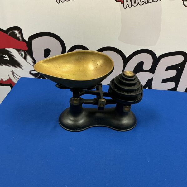 Set of kitchen balance scales with weights