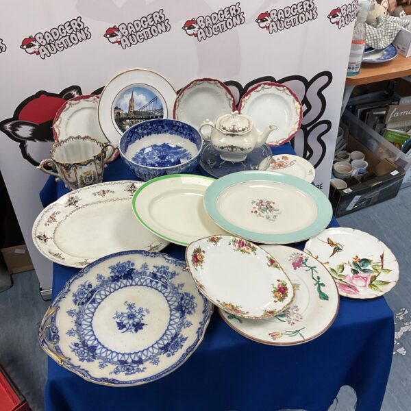 Vintage plates and chargers lot with Wedgwood bowl.