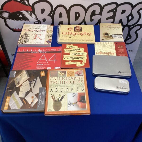 Collection of calligraphy books and sets for learning hand lettering.
