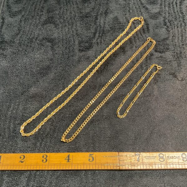 Two Yellowmetal necklaces and a bracelet