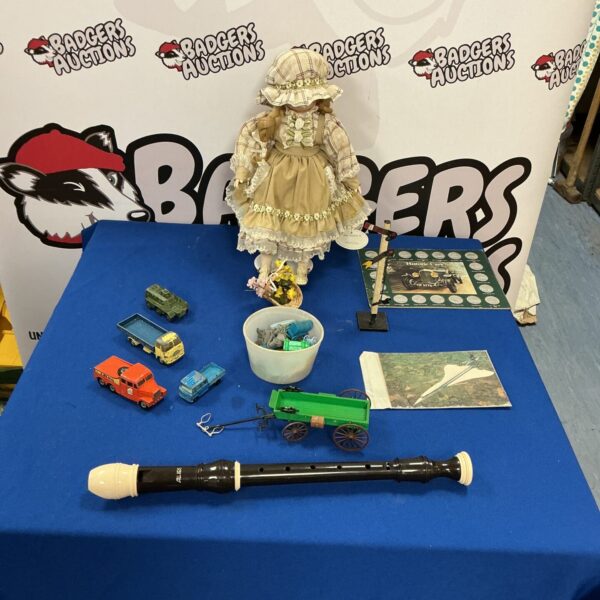 Mixed lot of vintage collectibles including a doll and recorder.