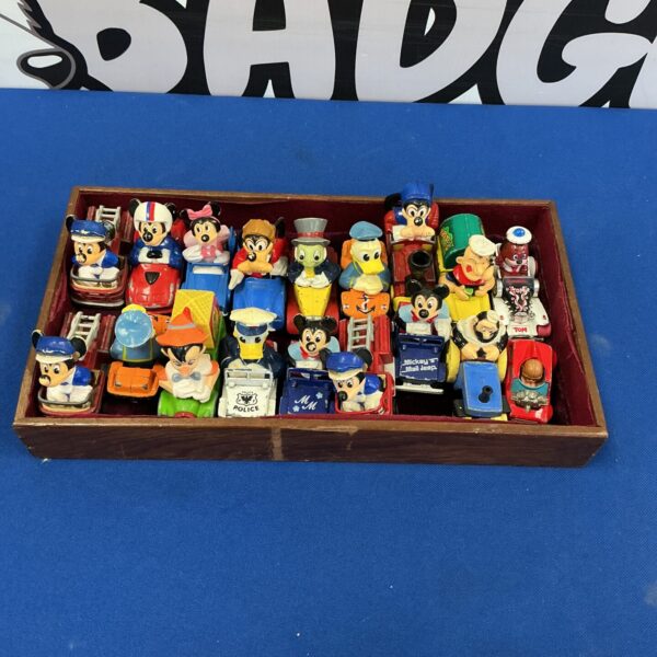 Vintage Disney character matchbox vehicles lot, including Mickey Mouse.