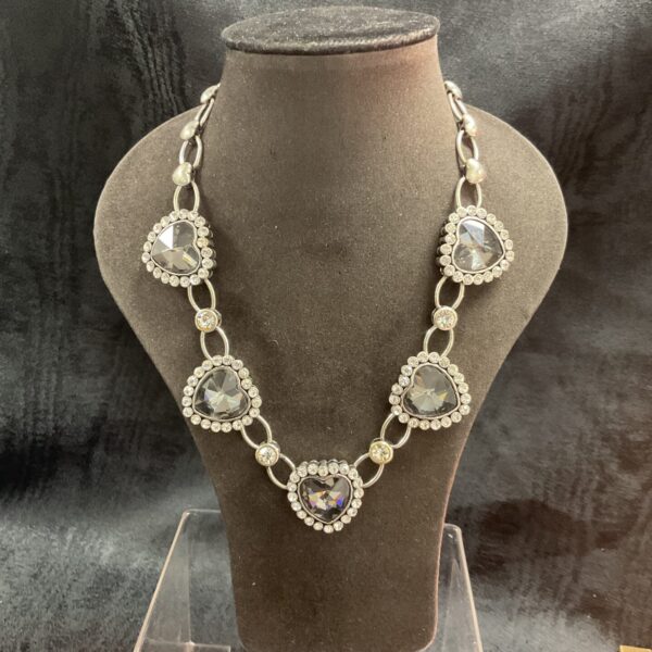 Sparkling Swarovski heart necklace with clear crystal pendants.
