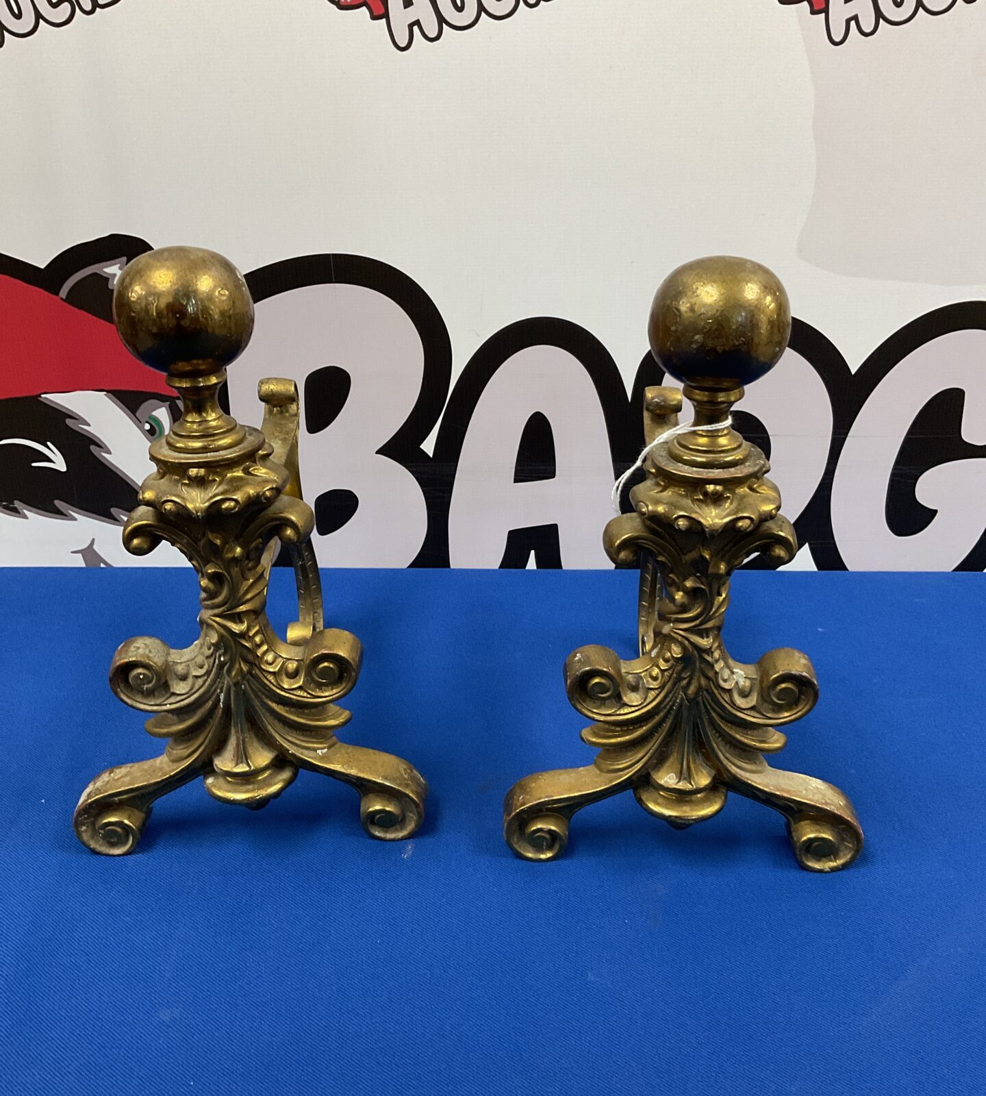 Pair of vintage brass firedogs