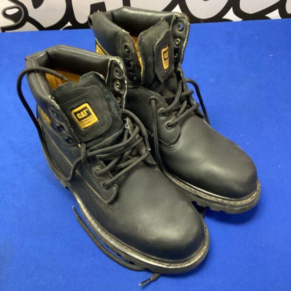 Caterpillar size 7 walking boots, durable outdoor footwear.