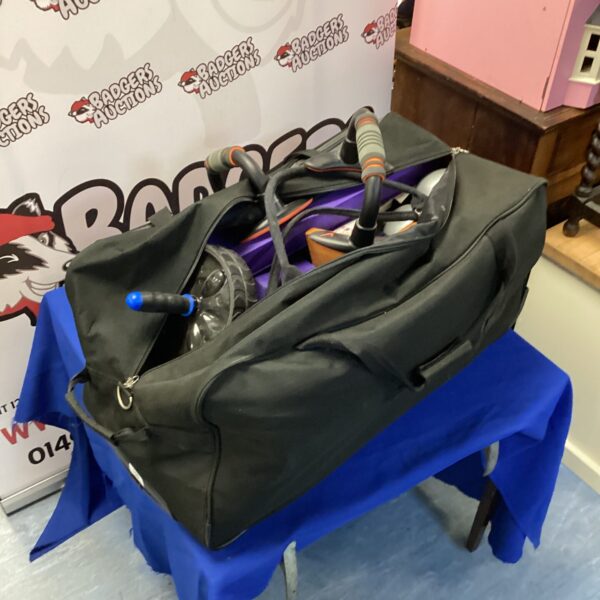 Bag of fitnes items inc yoga mats, crunch wheel & push up bars