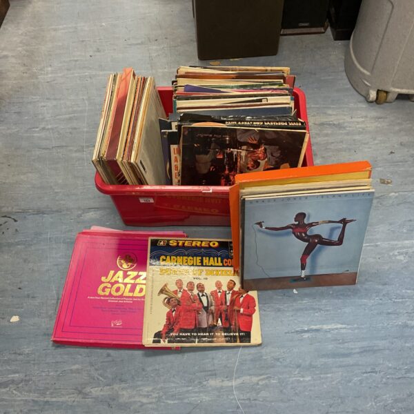 Vinyl record lot featuring Grace Jones and other artists.