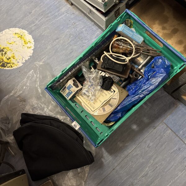 Garage clearance lot with vintage screwdrivers and assorted tools.