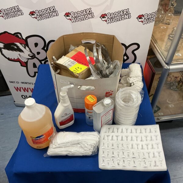 Box of cleaning products and hardware
