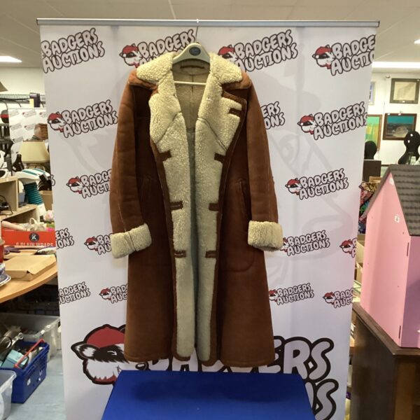Brown vintage sheepskin coat size L, warm winter outerwear.