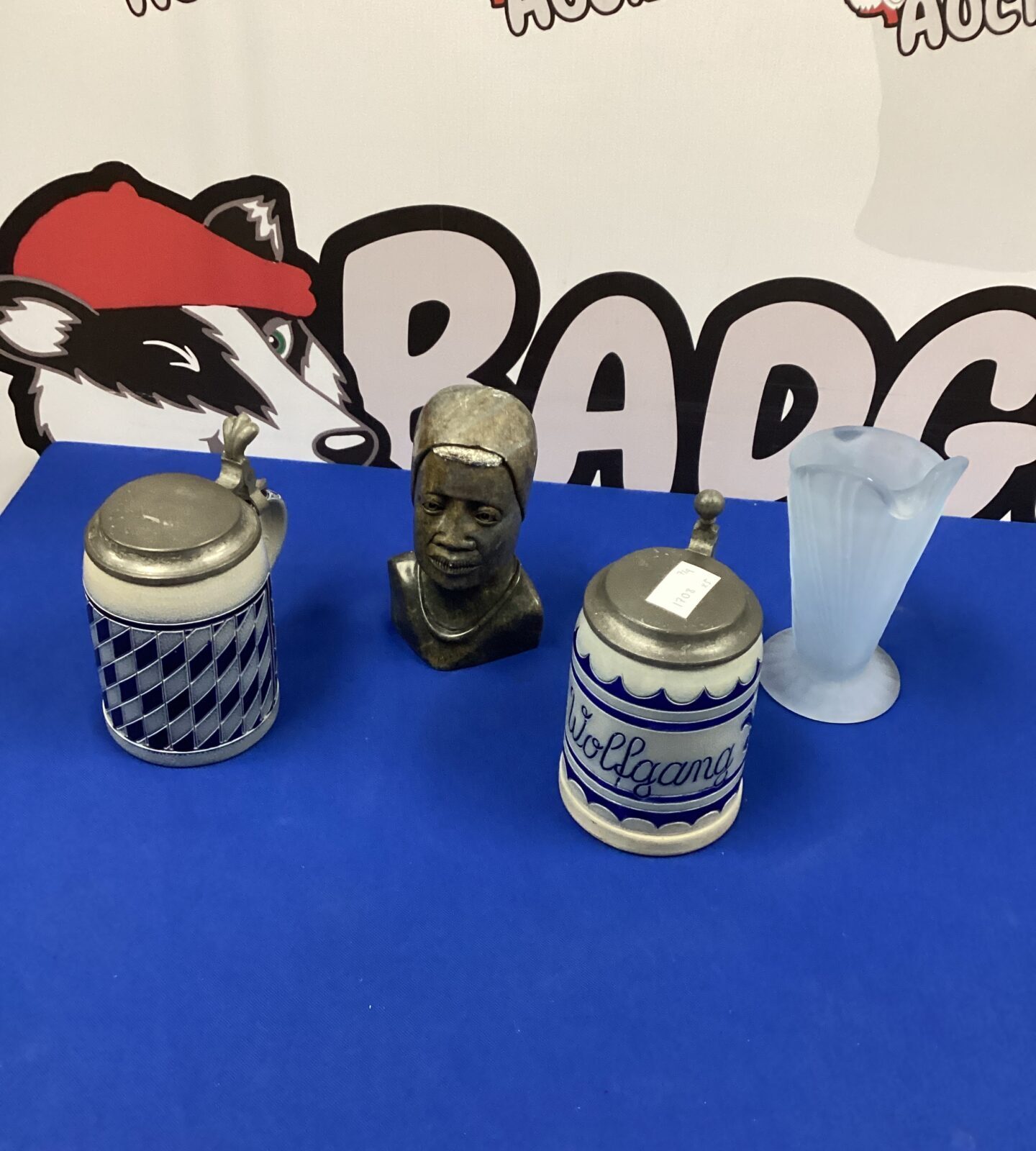 Two German Beer Steins with carved head and vase
