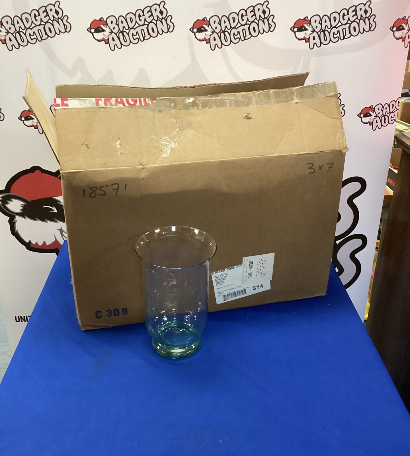 Five glass storm lanterns
