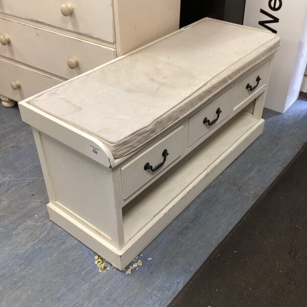 Wooden hall bench with storage drawers and upholstered seat.