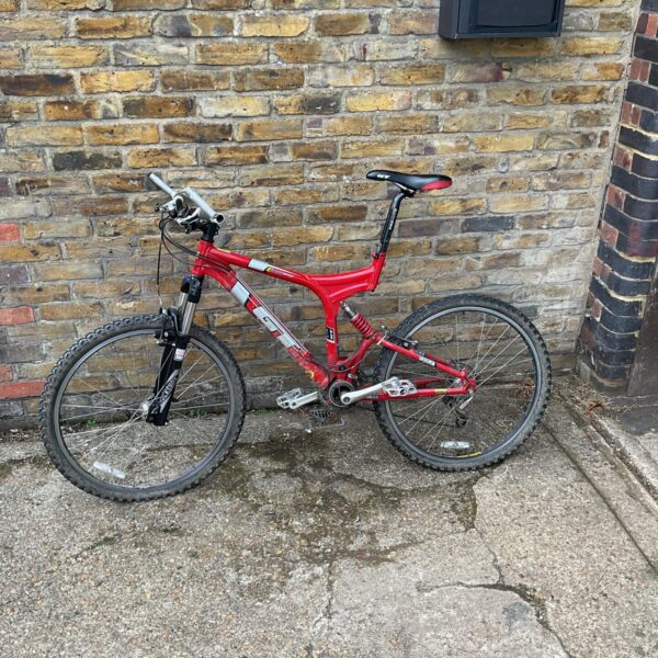 Red and silver GT Drive Sport Pro Lite mountain bike for sale.