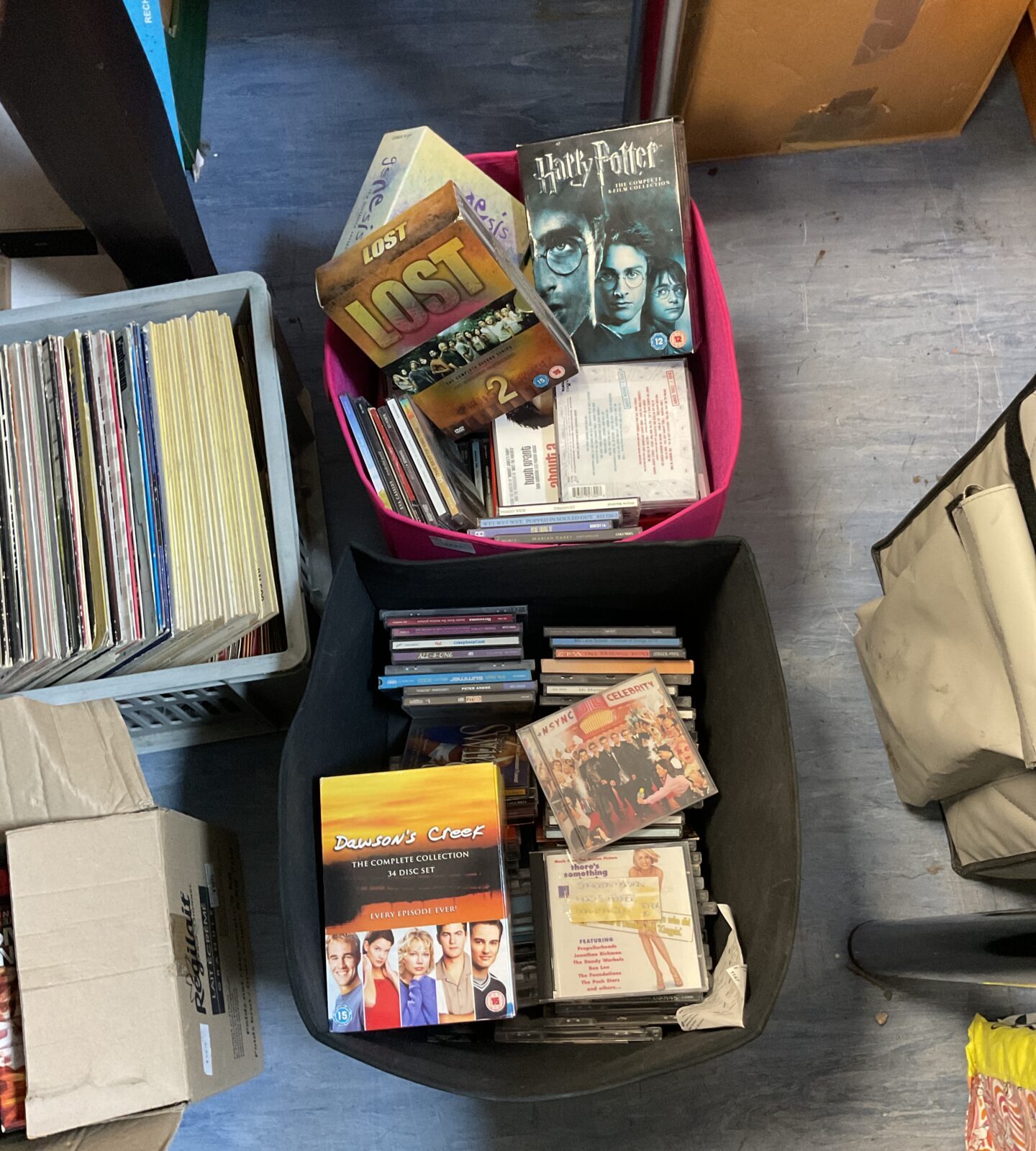 2 box collextion of CDs with some box sets incl. Harry Potter complete collection, Lost, Dawson’s Creek