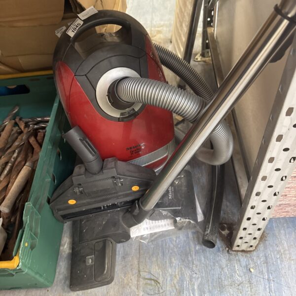 Red and black Miele TT5000 Stowaway cylinder vacuum cleaner.