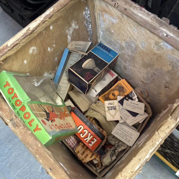 Box of clearance items inc totopoly(has come out of box) photography light bulbs & others