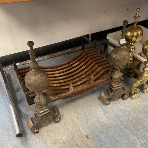 Large cast iron fire grate with pair of firedogs