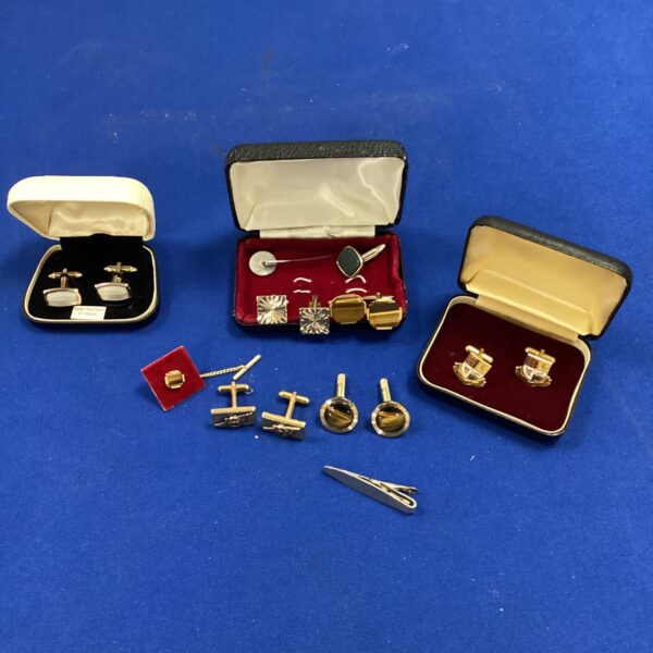 Three boxes of mixed cuff links